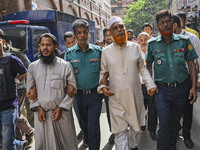 Police are taking protesters to the court after arresting them in Dhaka, Bangladesh, on July 26, 2024. The number of arrests in days of viol...