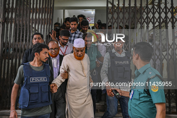 Police are taking protesters to the jail after their court hearing in Dhaka, Bangladesh, on July 26, 2024. The number of arrests in days of...