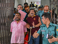 Police are taking protesters to the jail after their court hearing in Dhaka, Bangladesh, on July 26, 2024. The number of arrests in days of...