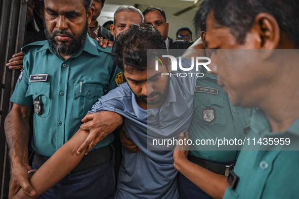 Arson is happening at Setu Bhaban, and Ex-DUCSU VP Nur is being sent to jail after remand in Dhaka, Bangladesh, on July 26, 2024. The number...