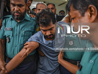 Arson is happening at Setu Bhaban, and Ex-DUCSU VP Nur is being sent to jail after remand in Dhaka, Bangladesh, on July 26, 2024. The number...