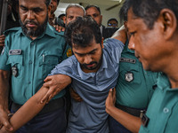 Arson is happening at Setu Bhaban, and Ex-DUCSU VP Nur is being sent to jail after remand in Dhaka, Bangladesh, on July 26, 2024. The number...