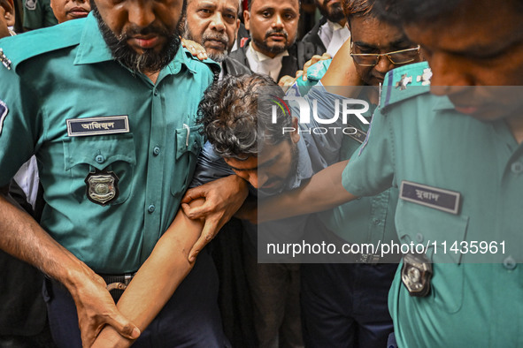 Arson is happening at Setu Bhaban, and Ex-DUCSU VP Nur is being sent to jail after remand in Dhaka, Bangladesh, on July 26, 2024. The number...