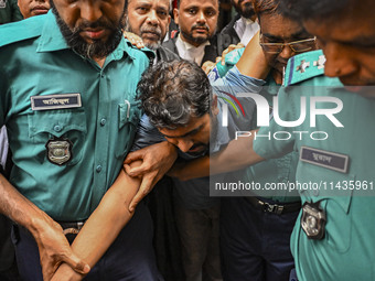 Arson is happening at Setu Bhaban, and Ex-DUCSU VP Nur is being sent to jail after remand in Dhaka, Bangladesh, on July 26, 2024. The number...