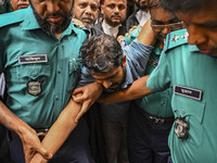 Arson is happening at Setu Bhaban, and Ex-DUCSU VP Nur is being sent to jail after remand in Dhaka, Bangladesh, on July 26, 2024. The number...