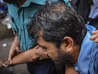 Arson is happening at Setu Bhaban, and Ex-DUCSU VP Nur is being sent to jail after remand in Dhaka, Bangladesh, on July 26, 2024. The number...