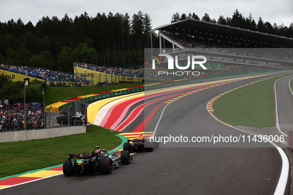 Max Verstappen of Red Bull Racing and Lewis Hamilton of Mercedes during second practice ahead of the Formula 1 Belgian Grand Prix at Spa-Fra...