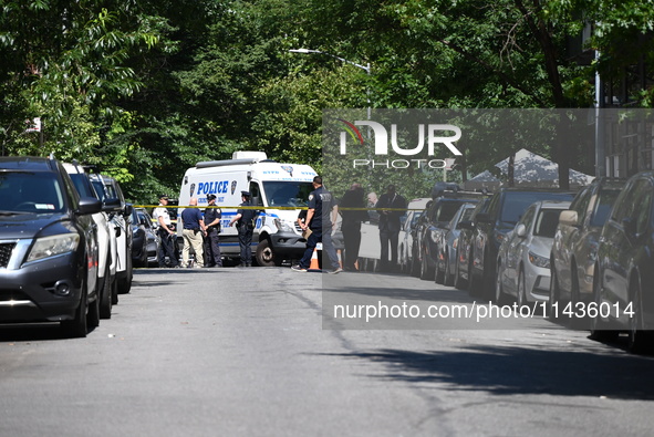 Police from the Crime Scene Unit of the NYPD are arriving at the scene and investigating after two women are fatally shot in a murder-suicid...