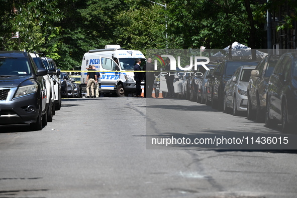 Police from the Crime Scene Unit of the NYPD are arriving at the scene and investigating after two women are fatally shot in a murder-suicid...