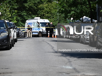 Police from the Crime Scene Unit of the NYPD are arriving at the scene and investigating after two women are fatally shot in a murder-suicid...