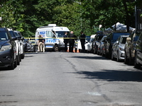 Police from the Crime Scene Unit of the NYPD are arriving at the scene and investigating after two women are fatally shot in a murder-suicid...