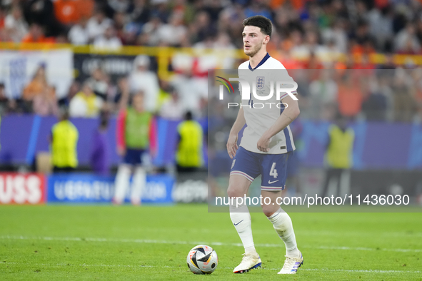 Declan Rice defensive midfield of England and Arsenal FC during the UEFA EURO 2024 semi-final match between Netherlands and England at Footb...