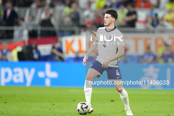 Declan Rice defensive midfield of England and Arsenal FC during the UEFA EURO 2024 semi-final match between Netherlands and England at Footb...