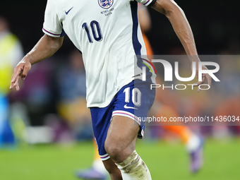 Jude Bellingham attacking midfield of England and Real Madrid during the UEFA EURO 2024 semi-final match between Netherlands and England at...