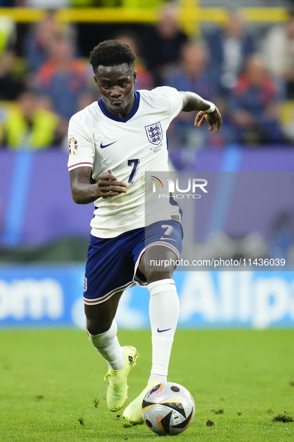 Bukayo Saka right winger of England and Arsenal FC during the UEFA EURO 2024 semi-final match between Netherlands and England at Football St...