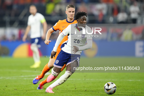 Kobbie Mainoo central midfield of England and Manchester United during the UEFA EURO 2024 semi-final match between Netherlands and England a...