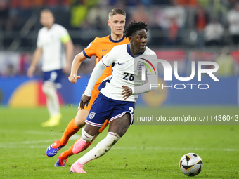 Kobbie Mainoo central midfield of England and Manchester United during the UEFA EURO 2024 semi-final match between Netherlands and England a...