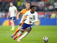 Kobbie Mainoo central midfield of England and Manchester United during the UEFA EURO 2024 semi-final match between Netherlands and England a...