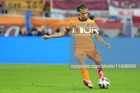 Nathan Ake centre-back of Netherlands and Manchester City during the UEFA EURO 2024 semi-final match between Netherlands and England at Foot...