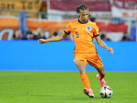 Nathan Ake centre-back of Netherlands and Manchester City during the UEFA EURO 2024 semi-final match between Netherlands and England at Foot...