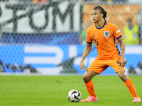 Nathan Ake centre-back of Netherlands and Manchester City during the UEFA EURO 2024 semi-final match between Netherlands and England at Foot...