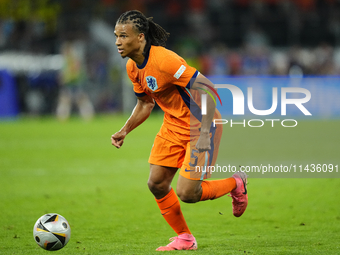 Nathan Ake centre-back of Netherlands and Manchester City during the UEFA EURO 2024 semi-final match between Netherlands and England at Foot...