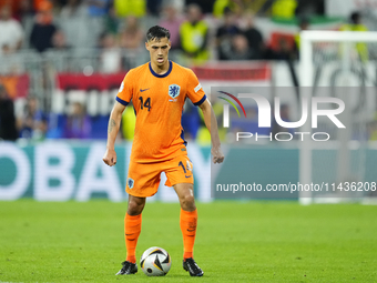 Tijjani Reijnders central midfield of Netherlands and AC Milan during the UEFA EURO 2024 semi-final match between Netherlands and England at...