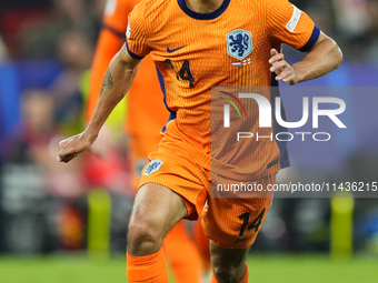 Tijjani Reijnders central midfield of Netherlands and AC Milan during the UEFA EURO 2024 semi-final match between Netherlands and England at...