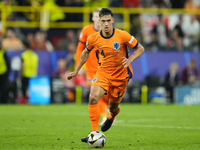 Tijjani Reijnders central midfield of Netherlands and AC Milan during the UEFA EURO 2024 semi-final match between Netherlands and England at...