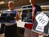 People hold banners during 'Free Paul Watson' demonstration in front of the Consulate General of Denmark in Krakow, Poland on July 26th, 202...