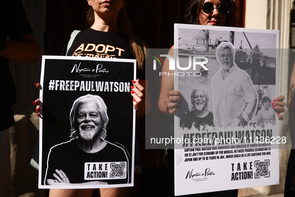 People hold banners during 'Free Paul Watson' demonstration in front of the Consulate General of Denmark in Krakow, Poland on July 26th, 202...