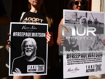 People hold banners during 'Free Paul Watson' demonstration in front of the Consulate General of Denmark in Krakow, Poland on July 26th, 202...