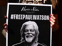 A person holds a banner during 'Free Paul Watson' demonstration in front of the Consulate General of Denmark in Krakow, Poland on July 26th,...