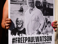 A person holds a banner during 'Free Paul Watson' demonstration in front of the Consulate General of Denmark in Krakow, Poland on July 26th,...