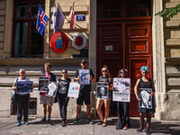 People hold banners during 'Free Paul Watson' demonstration in front of the Consulate General of Denmark in Krakow, Poland on July 26th, 202...