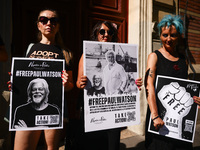 People hold banners during 'Free Paul Watson' demonstration in front of the Consulate General of Denmark in Krakow, Poland on July 26th, 202...