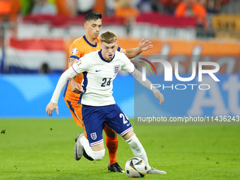 Cole Palmer attacking midfield of England and Chelsea FC and Tijjani Reijnders central midfield of Netherlands and AC Milan compete for the...