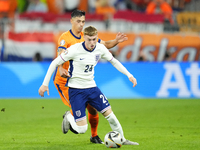 Cole Palmer attacking midfield of England and Chelsea FC and Tijjani Reijnders central midfield of Netherlands and AC Milan compete for the...