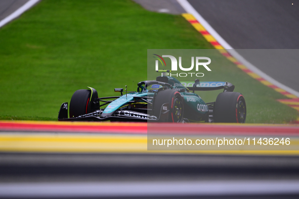 Fernando Alonso of Aston Martin Cognizant F1 Team is driving his single-seater during the free practice of the Belgian GP, the 14th race of...