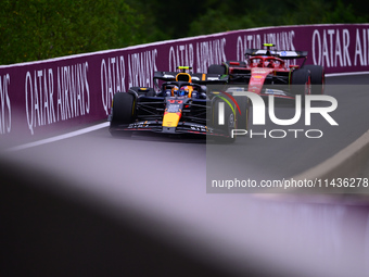 Sergio Perez of Red Bull Racing Honda is driving his single-seater during the free practice of the Belgian GP, the 14th race of the Formula...