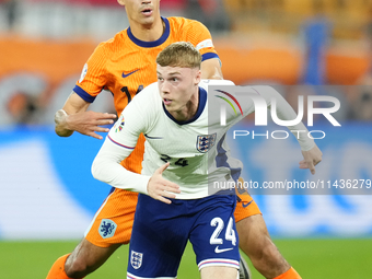 Cole Palmer attacking midfield of England and Chelsea FC and Tijjani Reijnders central midfield of Netherlands and AC Milan compete for the...