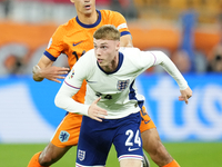 Cole Palmer attacking midfield of England and Chelsea FC and Tijjani Reijnders central midfield of Netherlands and AC Milan compete for the...