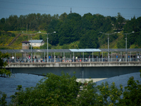 People are seen waiting to cross the border into Russia as seen from  Narva, Estonia on 24 July, 2024. Estonian authorities have closed the...