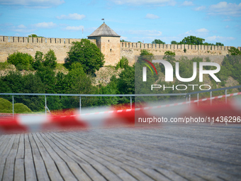 The Ivangorod Fortress is seen accross the river in Narva, Estonia on 24 July, 2024. Estonian authorities have closed the bridge that connec...