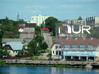 A building with a banner reading ''Happy holidays, Ivangorod'' is seen in Ivangorod, Russia accross the Narva River in Narva, Estonia on 24...