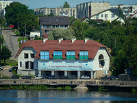 A building with a banner reading ''Happy holidays, Ivangorod'' is seen in Ivangorod, Russia accross the Narva River in Narva, Estonia on 24...