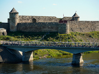 The bridge connecting Estonia with Russia with the Ivangorod Fortress in the background is seen in Narva, Estonia on 24 July, 2024. Estonian...