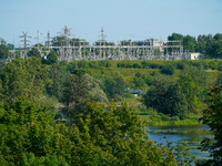 A transformer station with power lines is seen in Ivangorod, Russia accross the Narva River in Narva, Estonia on 24 July, 2024. Estonian aut...