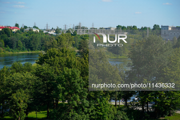 A transformer station with power lines is seen in Ivangorod, Russia accross the Narva River in Narva, Estonia on 24 July, 2024. Estonian aut...