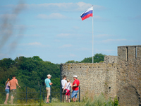 A Russian flag flies on the Ivangorod Frotress as seen from the Narva Castle in Narva, Estonia on 24 July, 2024. Estonian authorities have c...